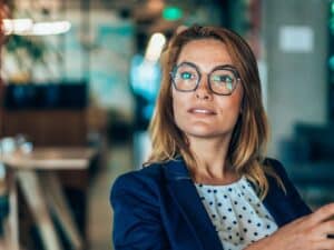 A woman speaking in a corporate environment